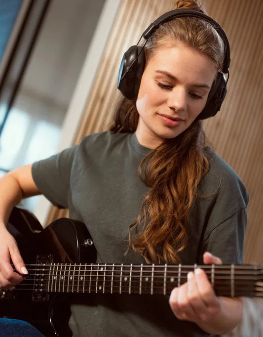 Alpine_Defender_girl_playing_guitar