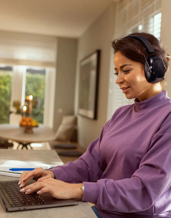 Alpine_ear_defenders_woman_at_desk