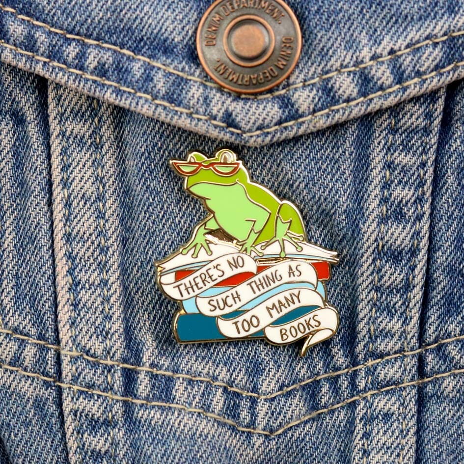 Jubly-Umph_theres_no_such_thing_as_too_many_books_lapel_pin_on_denim_jacket
