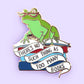 Jubly-Umph_theres_no_such_thing_as_too_many_books_lapel_pin_on_pale_background