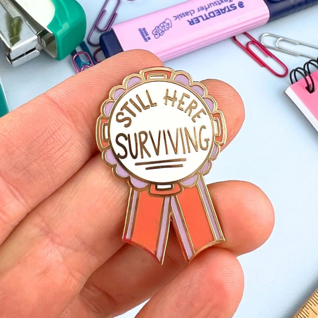 Jubly_Umph_Still_here_surviving_lapel_pin