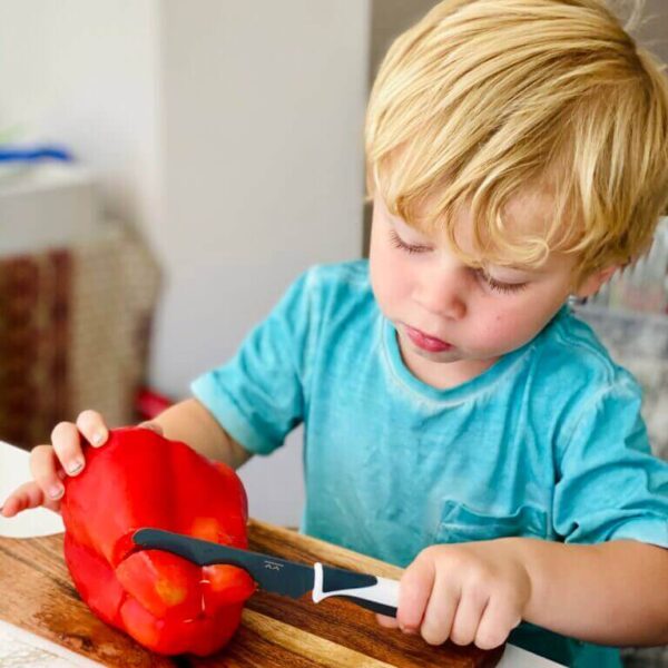 boy_cutting_capsicum_KiddiKutter_knife_charcoal